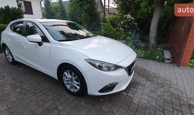 Белый Мазда 3, объемом двигателя 2 л и пробегом 169 тыс. км за 9400 $, фото 1 на Automoto.ua