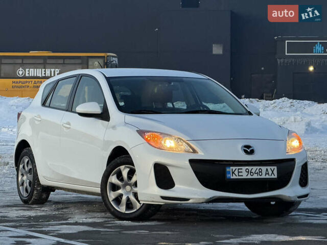 Белый Мазда 3, объемом двигателя 2 л и пробегом 199 тыс. км за 7850 $, фото 1 на Automoto.ua
