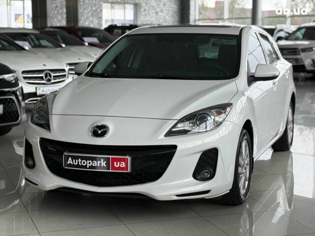 Белый Мазда 3, объемом двигателя 2 л и пробегом 85 тыс. км за 10490 $, фото 1 на Automoto.ua