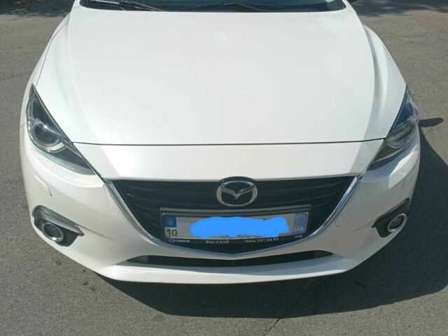 Білий Мазда 3, об'ємом двигуна 1.5 л та пробігом 115 тис. км за 14309 $, фото 1 на Automoto.ua