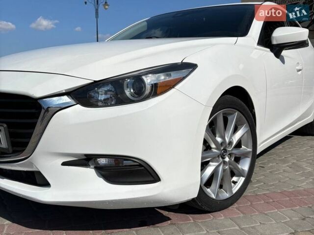 Белый Мазда 3, объемом двигателя 2 л и пробегом 106 тыс. км за 13500 $, фото 1 на Automoto.ua