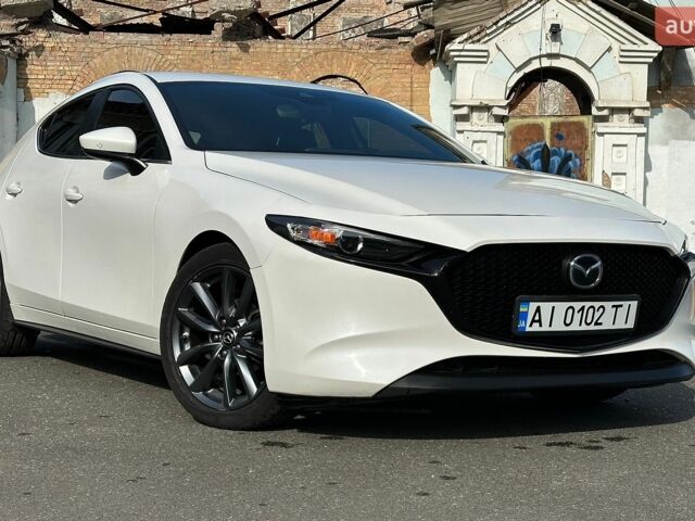 Білий Мазда 3, об'ємом двигуна 2.49 л та пробігом 97 тис. км за 16300 $, фото 1 на Automoto.ua