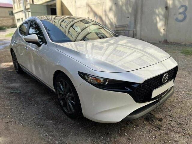 Білий Мазда 3, об'ємом двигуна 2 л та пробігом 124 тис. км за 9800 $, фото 1 на Automoto.ua