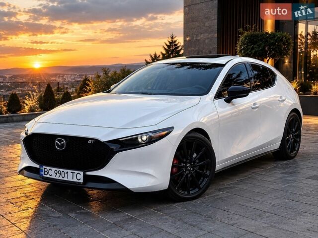 Білий Мазда 3, об'ємом двигуна 2.49 л та пробігом 69 тис. км за 21000 $, фото 1 на Automoto.ua