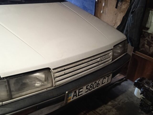 Белый Мазда 3, объемом двигателя 1.5 л и пробегом 333 тыс. км за 473 $, фото 1 на Automoto.ua