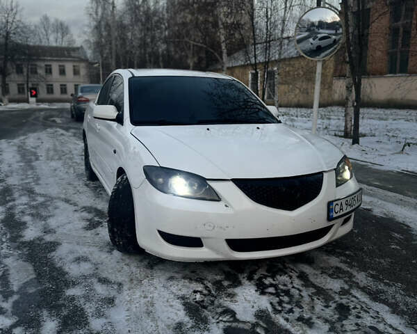 Білий Мазда 3, об'ємом двигуна 2 л та пробігом 270 тис. км за 4200 $, фото 1 на Automoto.ua