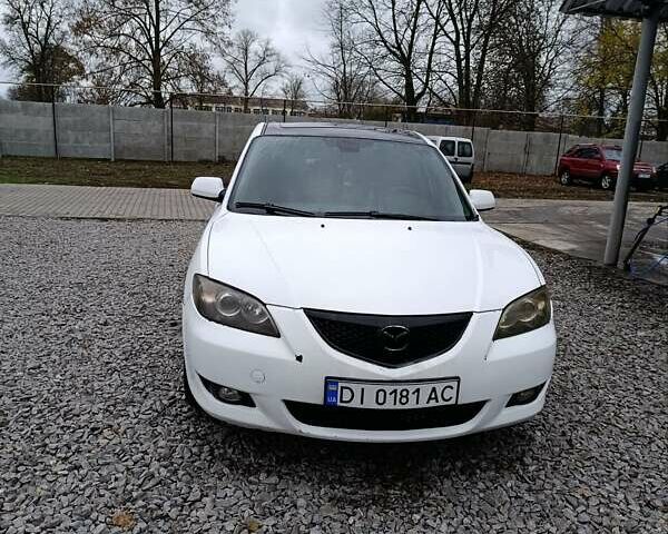 Білий Мазда 3, об'ємом двигуна 1.6 л та пробігом 235 тис. км за 5000 $, фото 1 на Automoto.ua