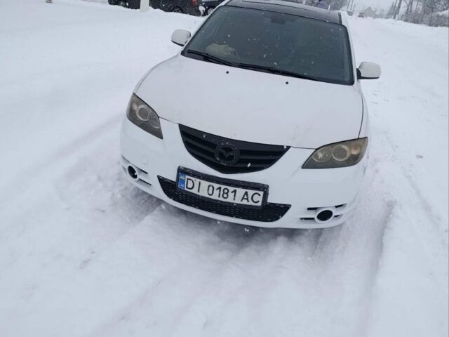 Білий Мазда 3, об'ємом двигуна 1.6 л та пробігом 235 тис. км за 4500 $, фото 1 на Automoto.ua