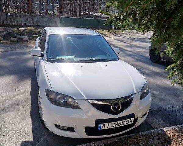 Білий Мазда 3, об'ємом двигуна 1.6 л та пробігом 204 тис. км за 6000 $, фото 1 на Automoto.ua