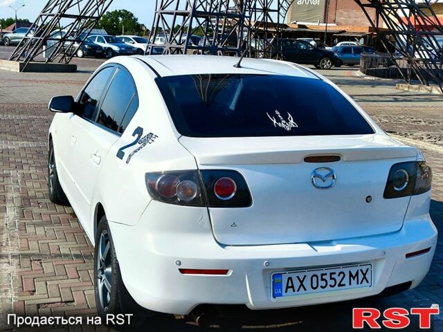 Білий Мазда 3, об'ємом двигуна 1.6 л та пробігом 215 тис. км за 5700 $, фото 1 на Automoto.ua