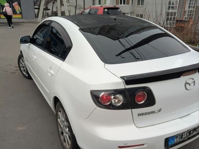 Белый Мазда 3, объемом двигателя 2 л и пробегом 160 тыс. км за 6550 $, фото 1 на Automoto.ua