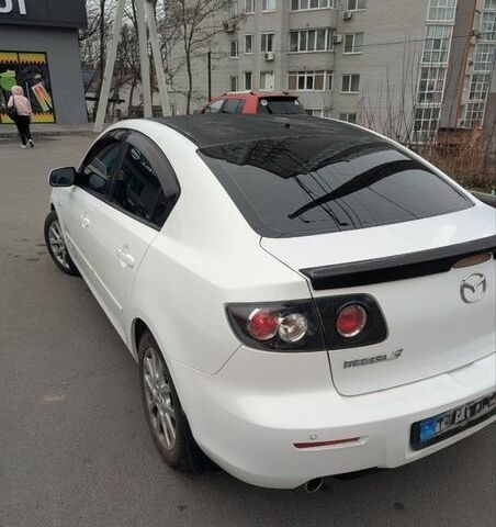 Белый Мазда 3, объемом двигателя 2 л и пробегом 160 тыс. км за 6550 $, фото 1 на Automoto.ua