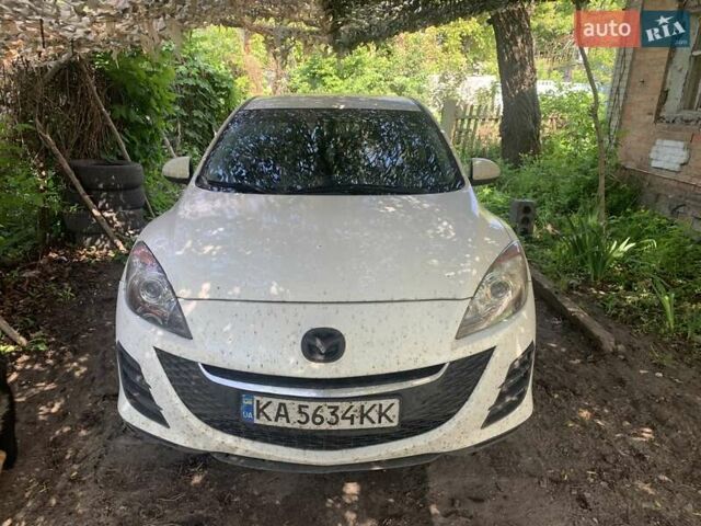 Белый Мазда 3, объемом двигателя 2 л и пробегом 310 тыс. км за 6500 $, фото 1 на Automoto.ua