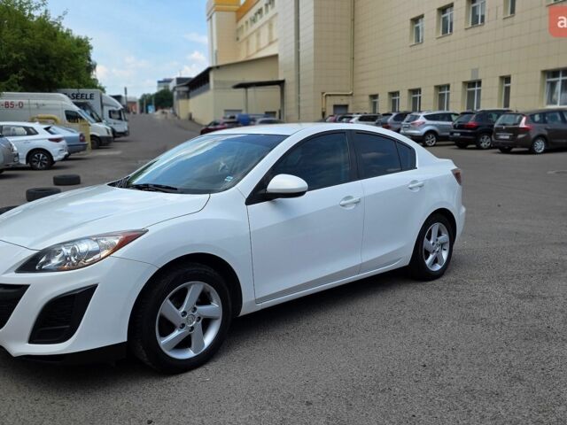 Белый Мазда 3, объемом двигателя 2 л и пробегом 200 тыс. км за 7800 $, фото 1 на Automoto.ua