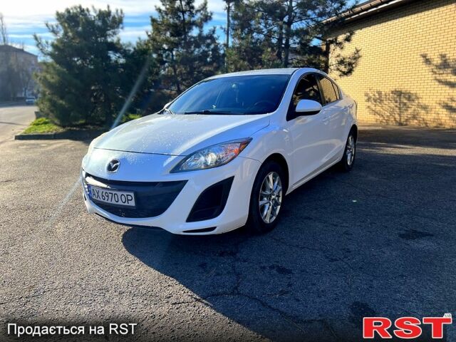 Білий Мазда 3, об'ємом двигуна 2 л та пробігом 140 тис. км за 6550 $, фото 1 на Automoto.ua