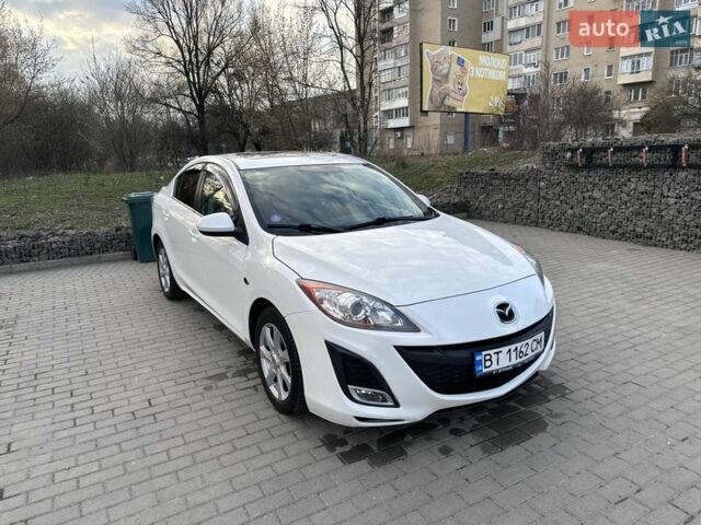 Білий Мазда 3, об'ємом двигуна 2 л та пробігом 199 тис. км за 6850 $, фото 1 на Automoto.ua