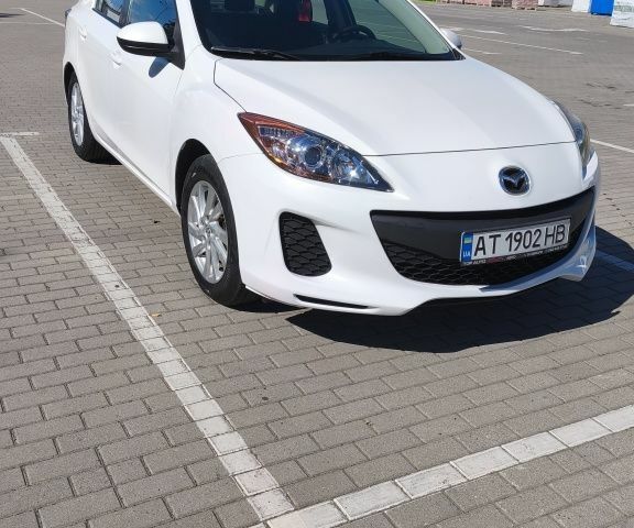 Білий Мазда 3, об'ємом двигуна 2 л та пробігом 256 тис. км за 7326 $, фото 1 на Automoto.ua