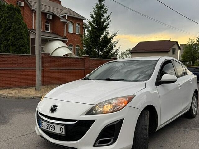 Белый Мазда 3, объемом двигателя 2 л и пробегом 162 тыс. км за 7900 $, фото 1 на Automoto.ua
