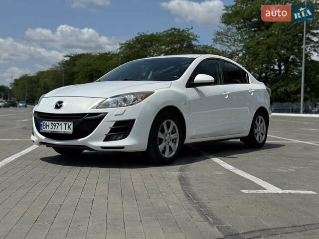 Белый Мазда 3, объемом двигателя 1.6 л и пробегом 180 тыс. км за 9350 $, фото 1 на Automoto.ua