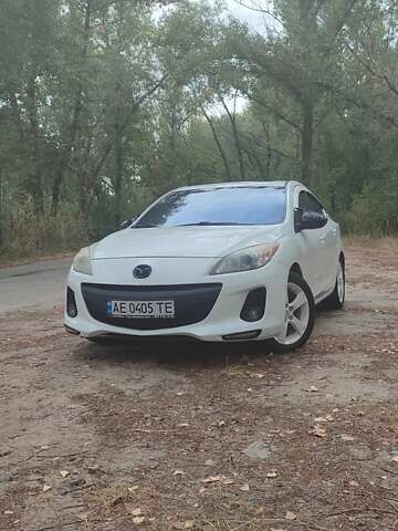 Белый Мазда 3, объемом двигателя 2 л и пробегом 200 тыс. км за 8200 $, фото 1 на Automoto.ua