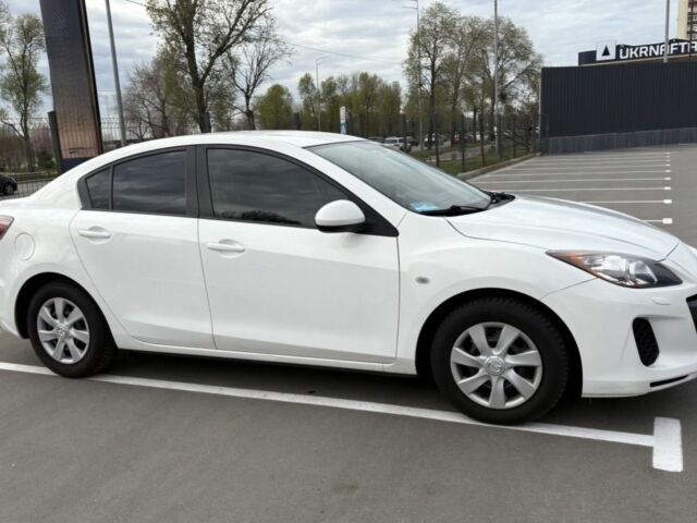 Белый Мазда 3, объемом двигателя 0 л и пробегом 116 тыс. км за 8450 $, фото 1 на Automoto.ua