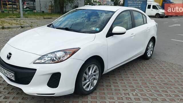 Белый Мазда 3, объемом двигателя 2 л и пробегом 200 тыс. км за 7500 $, фото 1 на Automoto.ua