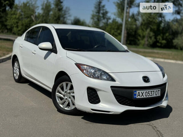 Білий Мазда 3, об'ємом двигуна 2 л та пробігом 182 тис. км за 7950 $, фото 1 на Automoto.ua