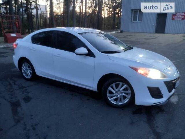 Белый Мазда 3, объемом двигателя 2 л и пробегом 235 тыс. км за 6600 $, фото 1 на Automoto.ua