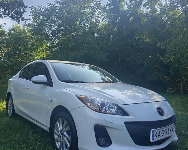 Білий Мазда 3, об'ємом двигуна 1.6 л та пробігом 207 тис. км за 8900 $, фото 1 на Automoto.ua