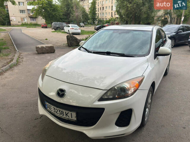 Белый Мазда 3, объемом двигателя 2 л и пробегом 182 тыс. км за 8300 $, фото 1 на Automoto.ua