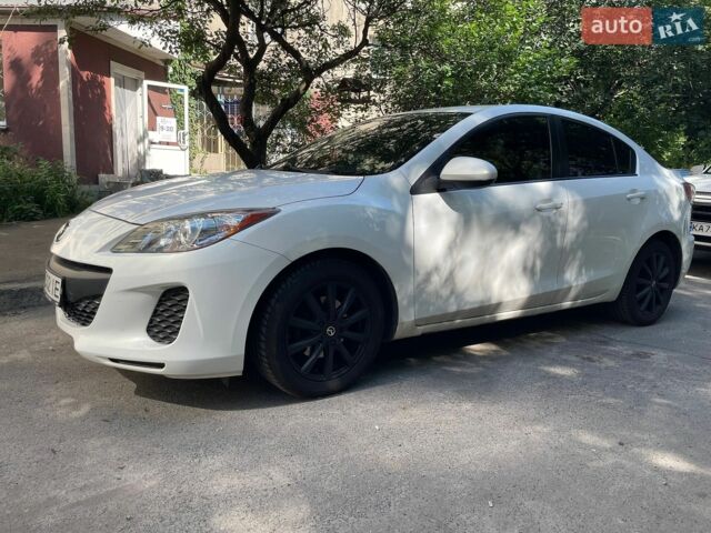 Белый Мазда 3, объемом двигателя 2 л и пробегом 190 тыс. км за 6450 $, фото 1 на Automoto.ua