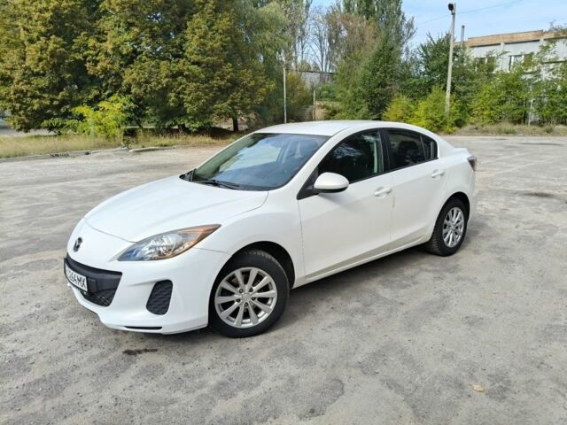 Белый Мазда 3, объемом двигателя 2 л и пробегом 220 тыс. км за 6032 $, фото 1 на Automoto.ua
