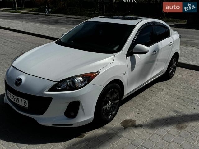 Белый Мазда 3, объемом двигателя 2 л и пробегом 115 тыс. км за 9000 $, фото 1 на Automoto.ua