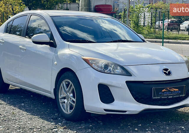 Білий Мазда 3, об'ємом двигуна 2 л та пробігом 170 тис. км за 8199 $, фото 1 на Automoto.ua