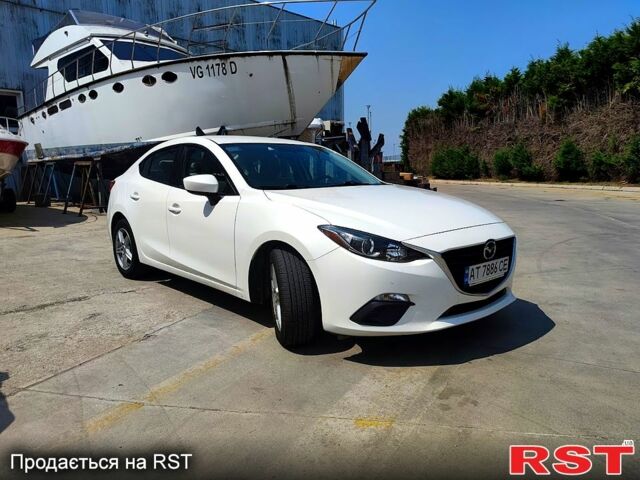 Белый Мазда 3, объемом двигателя 2 л и пробегом 193 тыс. км за 9900 $, фото 1 на Automoto.ua