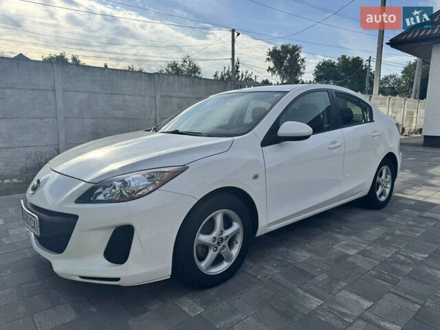 Білий Мазда 3, об'ємом двигуна 2 л та пробігом 200 тис. км за 7600 $, фото 1 на Automoto.ua