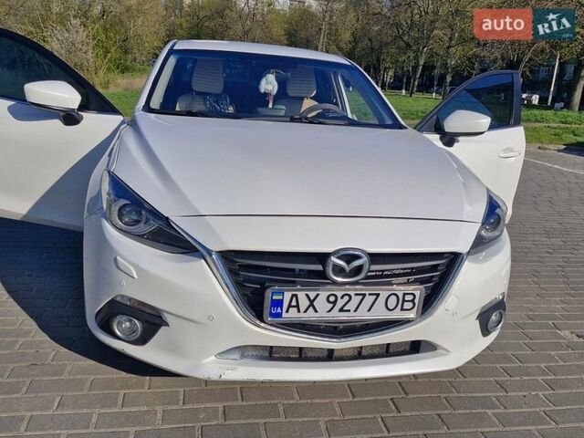 Белый Мазда 3, объемом двигателя 1.5 л и пробегом 115 тыс. км за 12199 $, фото 1 на Automoto.ua