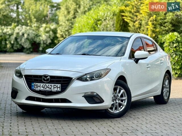 Белый Мазда 3, объемом двигателя 2 л и пробегом 156 тыс. км за 9700 $, фото 1 на Automoto.ua
