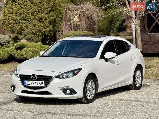 Белый Мазда 3, объемом двигателя 2 л и пробегом 140 тыс. км за 12500 $, фото 1 на Automoto.ua