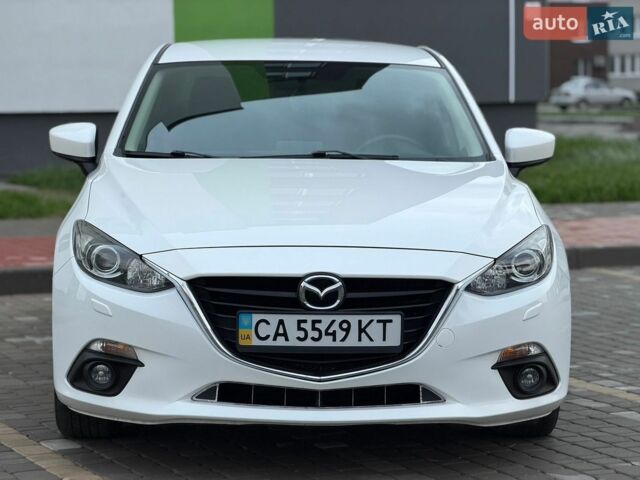 Білий Мазда 3, об'ємом двигуна 1.5 л та пробігом 92 тис. км за 13950 $, фото 1 на Automoto.ua