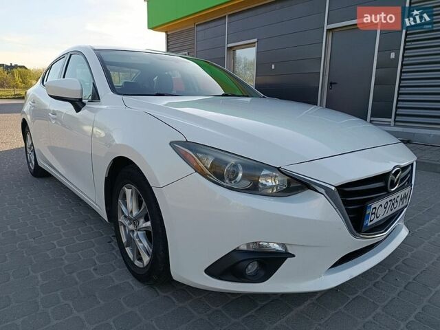 Белый Мазда 3, объемом двигателя 2 л и пробегом 248 тыс. км за 8900 $, фото 1 на Automoto.ua