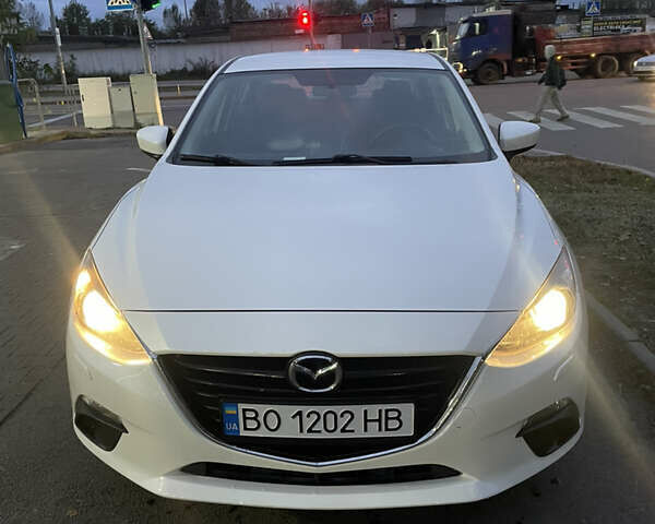Белый Мазда 3, объемом двигателя 1.6 л и пробегом 106 тыс. км за 10400 $, фото 1 на Automoto.ua