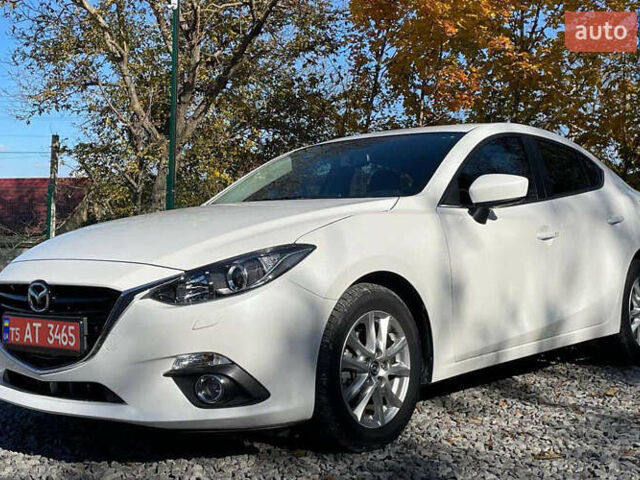 Белый Мазда 3, объемом двигателя 2 л и пробегом 160 тыс. км за 9900 $, фото 1 на Automoto.ua