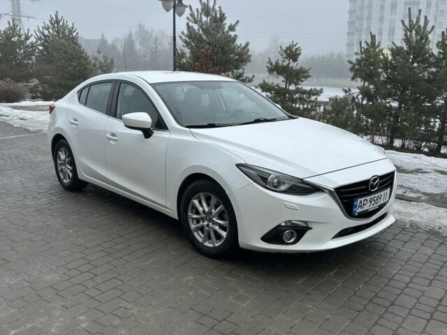 Белый Мазда 3, объемом двигателя 1.5 л и пробегом 128 тыс. км за 13500 $, фото 1 на Automoto.ua