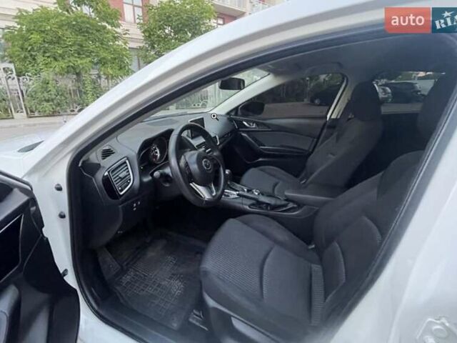 Белый Мазда 3, объемом двигателя 2 л и пробегом 114 тыс. км за 10001 $, фото 1 на Automoto.ua