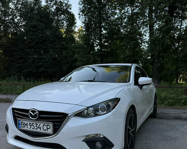 Белый Мазда 3, объемом двигателя 2 л и пробегом 129 тыс. км за 11000 $, фото 1 на Automoto.ua