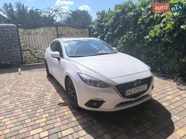 Белый Мазда 3, объемом двигателя 2 л и пробегом 148 тыс. км за 9400 $, фото 1 на Automoto.ua