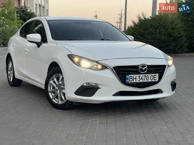 Белый Мазда 3, объемом двигателя 2 л и пробегом 200 тыс. км за 10500 $, фото 1 на Automoto.ua