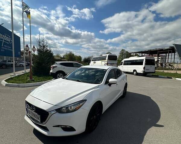 Белый Мазда 3, объемом двигателя 2 л и пробегом 116 тыс. км за 12800 $, фото 1 на Automoto.ua