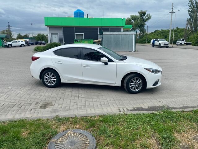Белый Мазда 3, объемом двигателя 2 л и пробегом 196 тыс. км за 11000 $, фото 1 на Automoto.ua